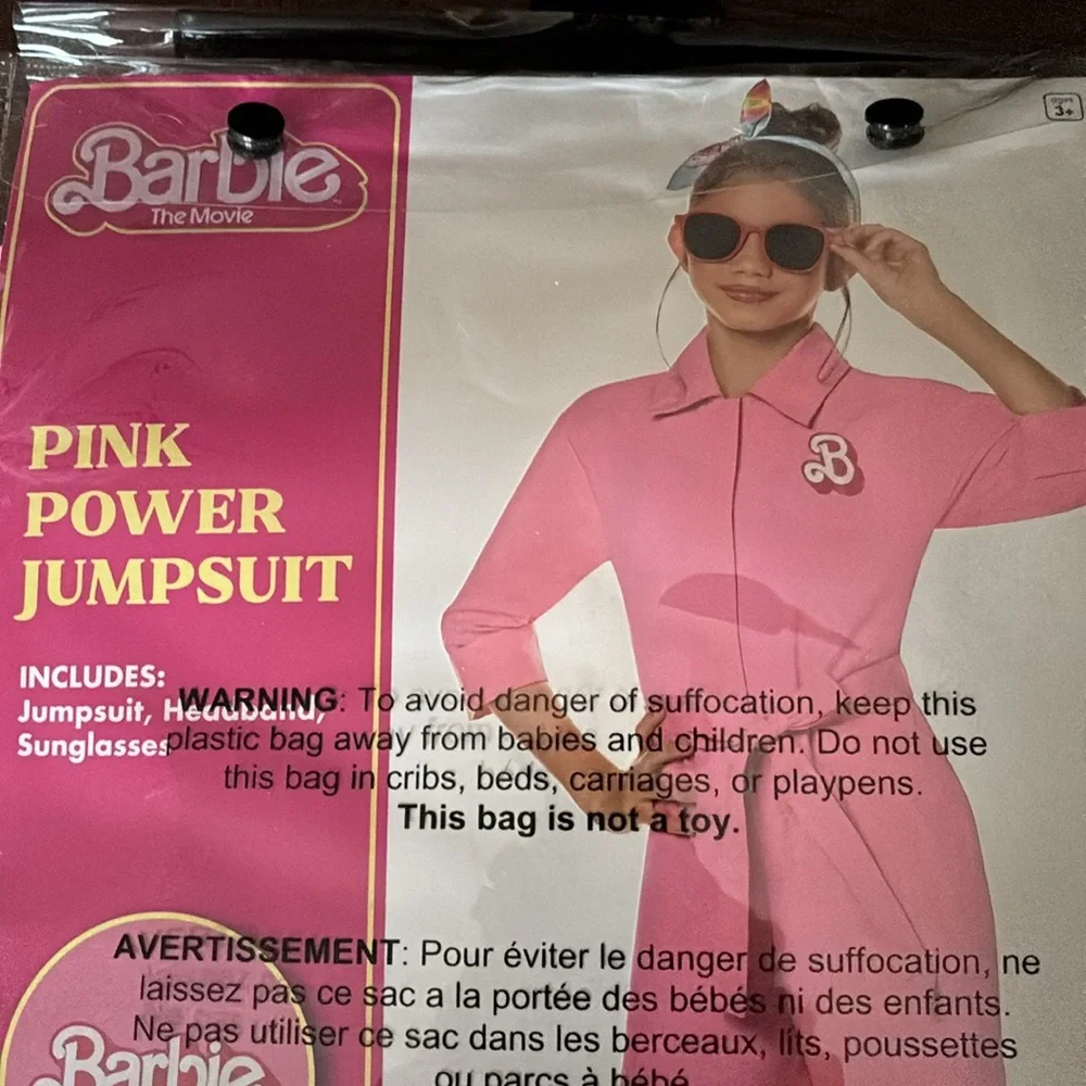 NWT  Spirit Halloween Barbie the Movie Kids Pink Power Jumpsuit size large 12-13